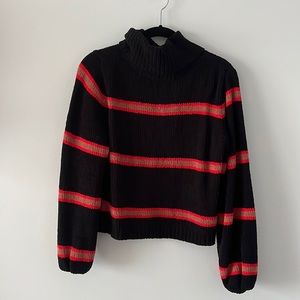 This is a 100% polyester turtleneck sweater